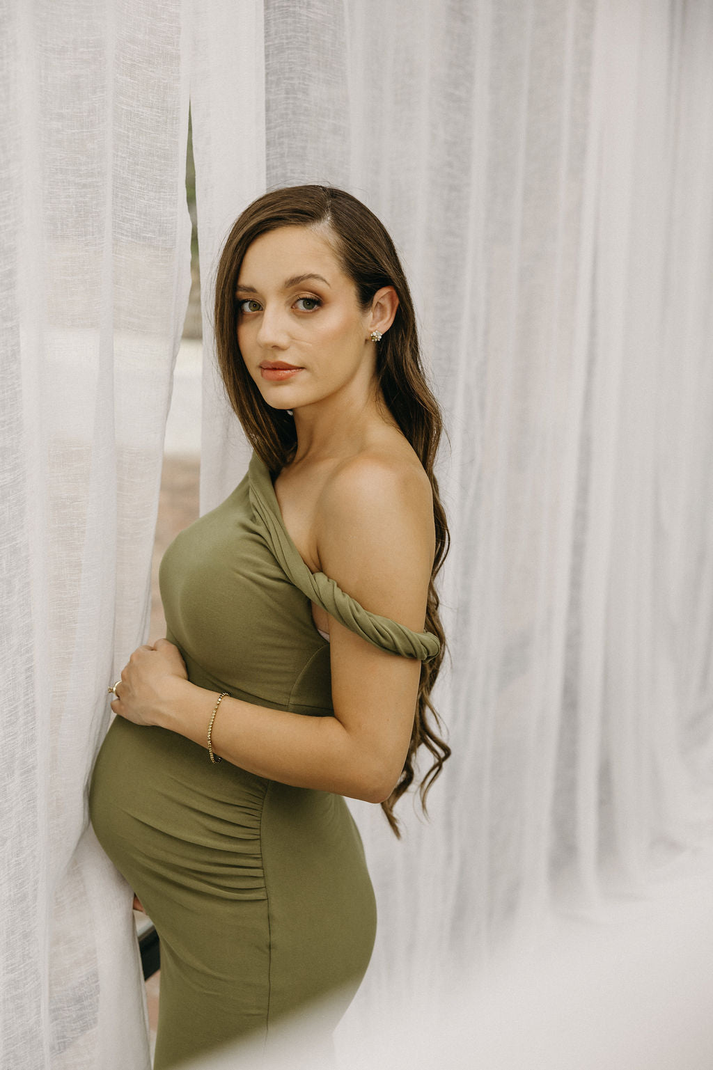 The Lita Olive Twisted Club London Maternity Dress